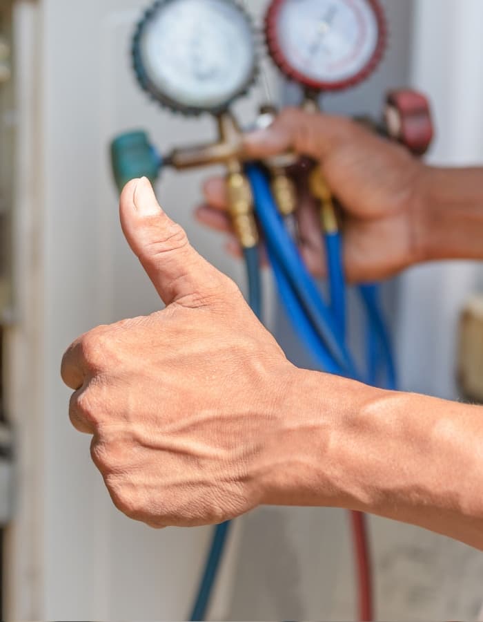 RJM technician installing HVAC system